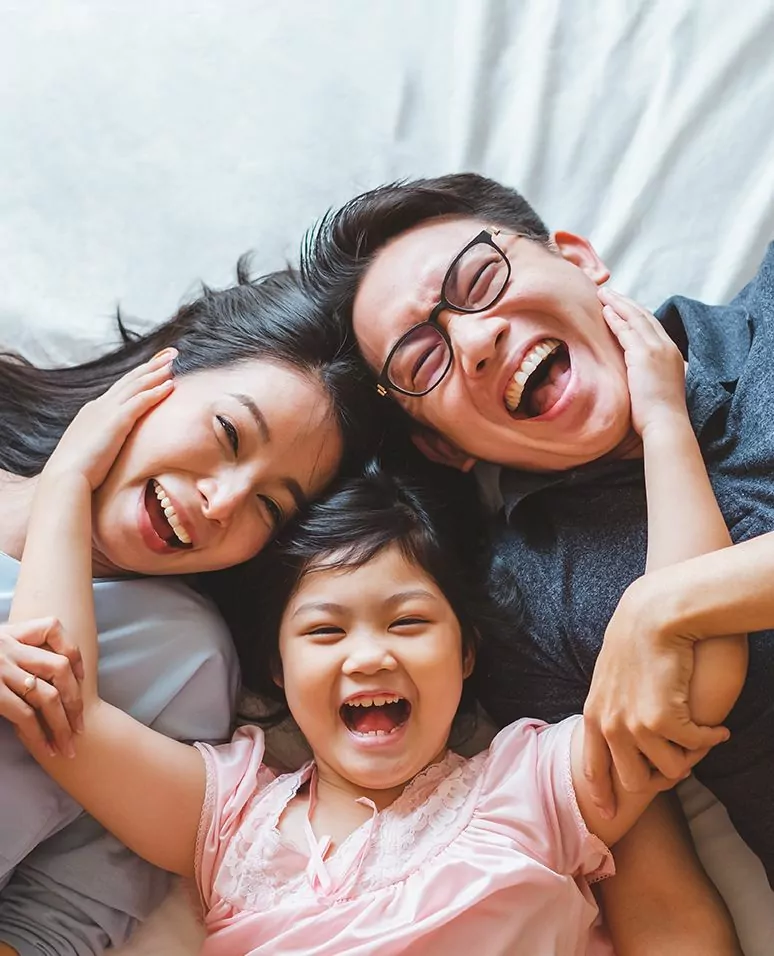 Smiling family with child happy about sleep apnea treatment in Longview
