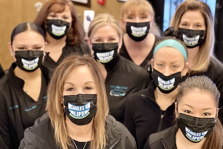 Vaca Dental staff members wearing surgical masks