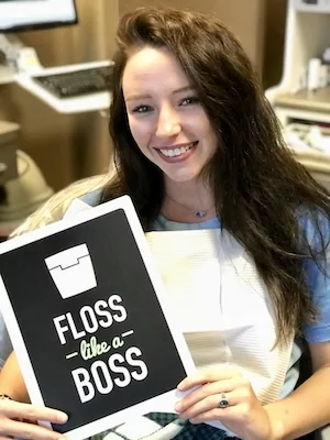 woman holding sign