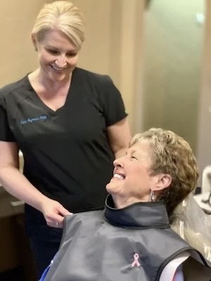 real patient with dental assistant in Longview