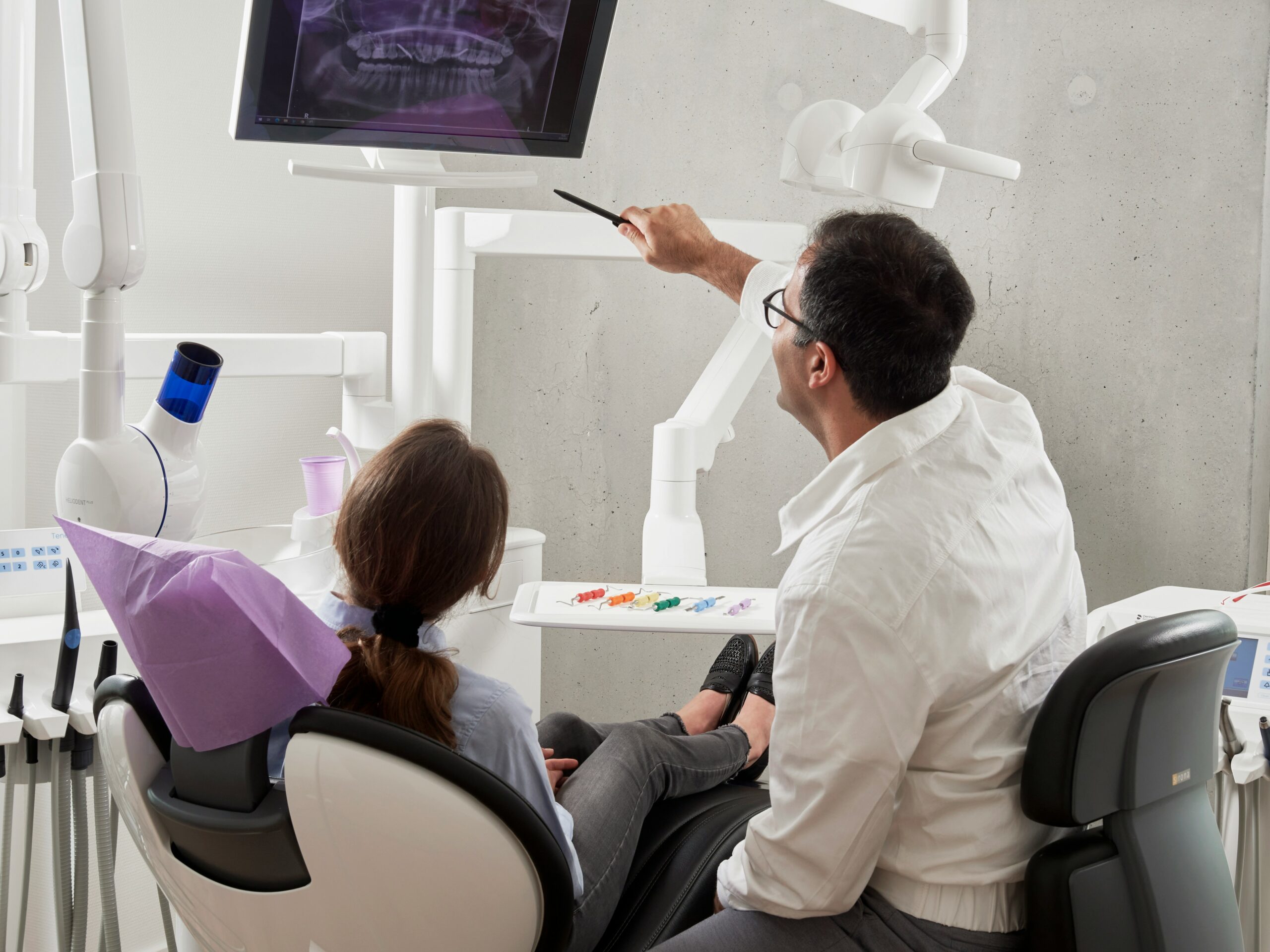 longview dentist performing an oral cancer screening on a kilgore, tx patient